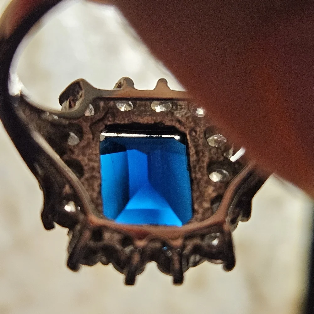Faux Elegant Blue and Silver Tone Emerald Cut .